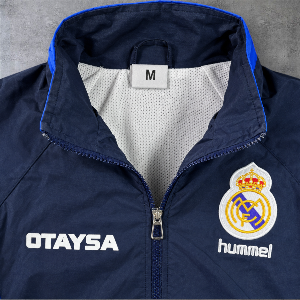 Casaco vintage Real Madrid 1991 azul marinho com fecho e emblema da A minha loja