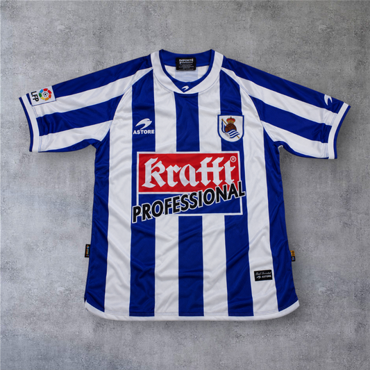 Camisola de futebol A minha loja Real Sociedad 2002/03 às riscas azuis e brancas com patrocinador Kraft