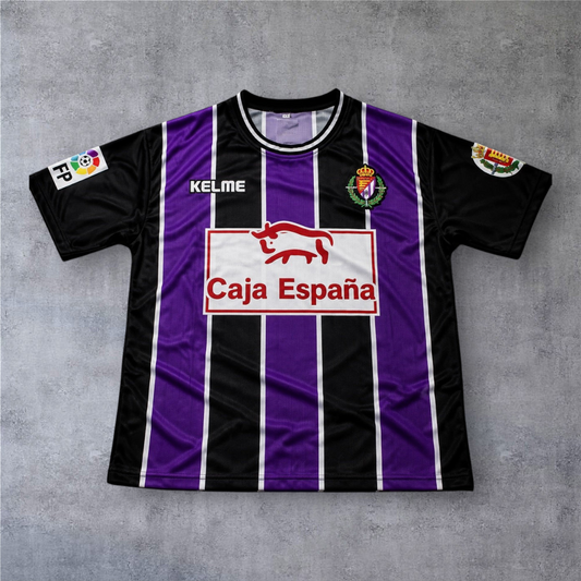 Camisola de futebol A minha loja do Valladolid 1999/00, modelo fora, com riscas verticais roxas e pretas e patrocinador
