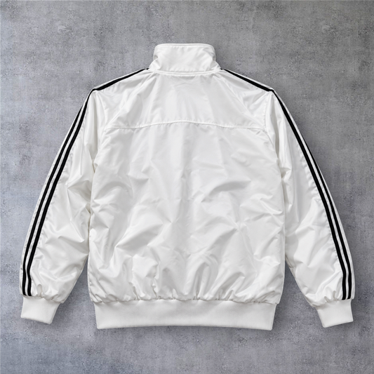 Casaco vintage A minha loja do Real Madrid 2013/14 em branco com riscas pretas nas mangas e fecho completo.