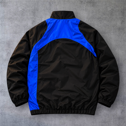 Casaco vintage de futebol Portugal da A minha loja, design full-zip preto e azul com detalhes desportivos.