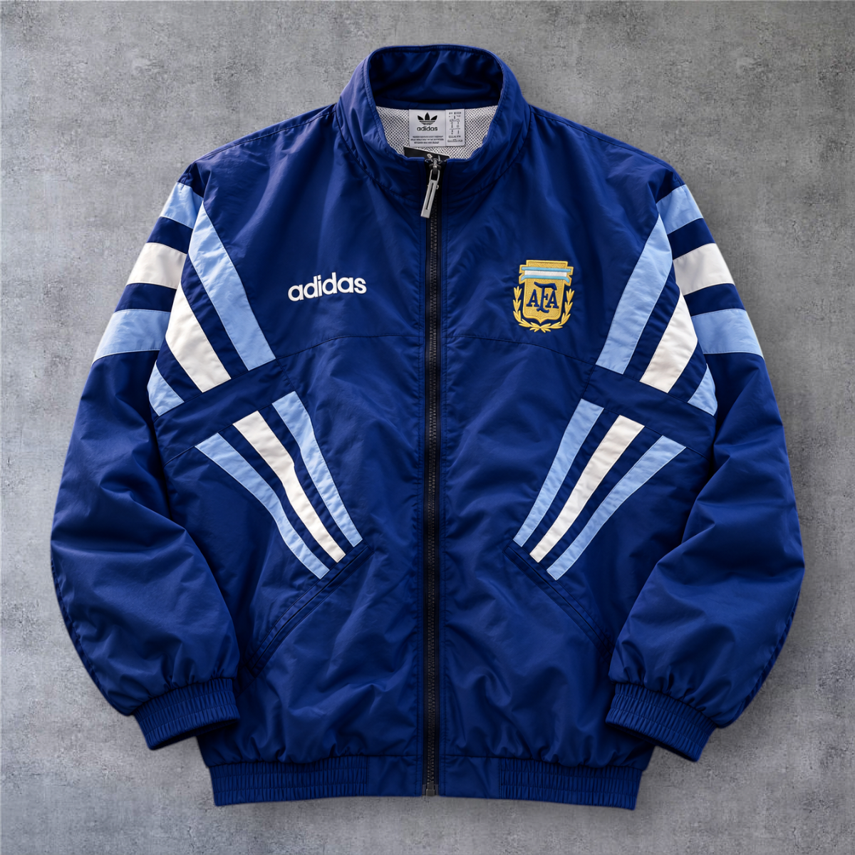Casaco vintage da Argentina 1998 azul com fecho completo e emblema da A minha loja
