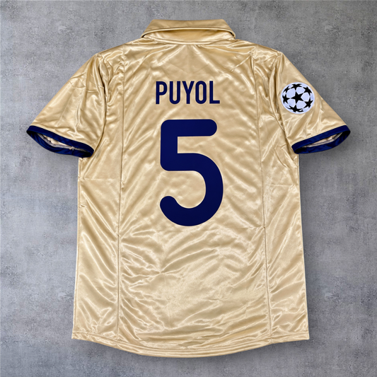 Camisola de futebol dourada A minha loja do Barcelona 2000/01 com o nome Puyol e o número 5 nas costas