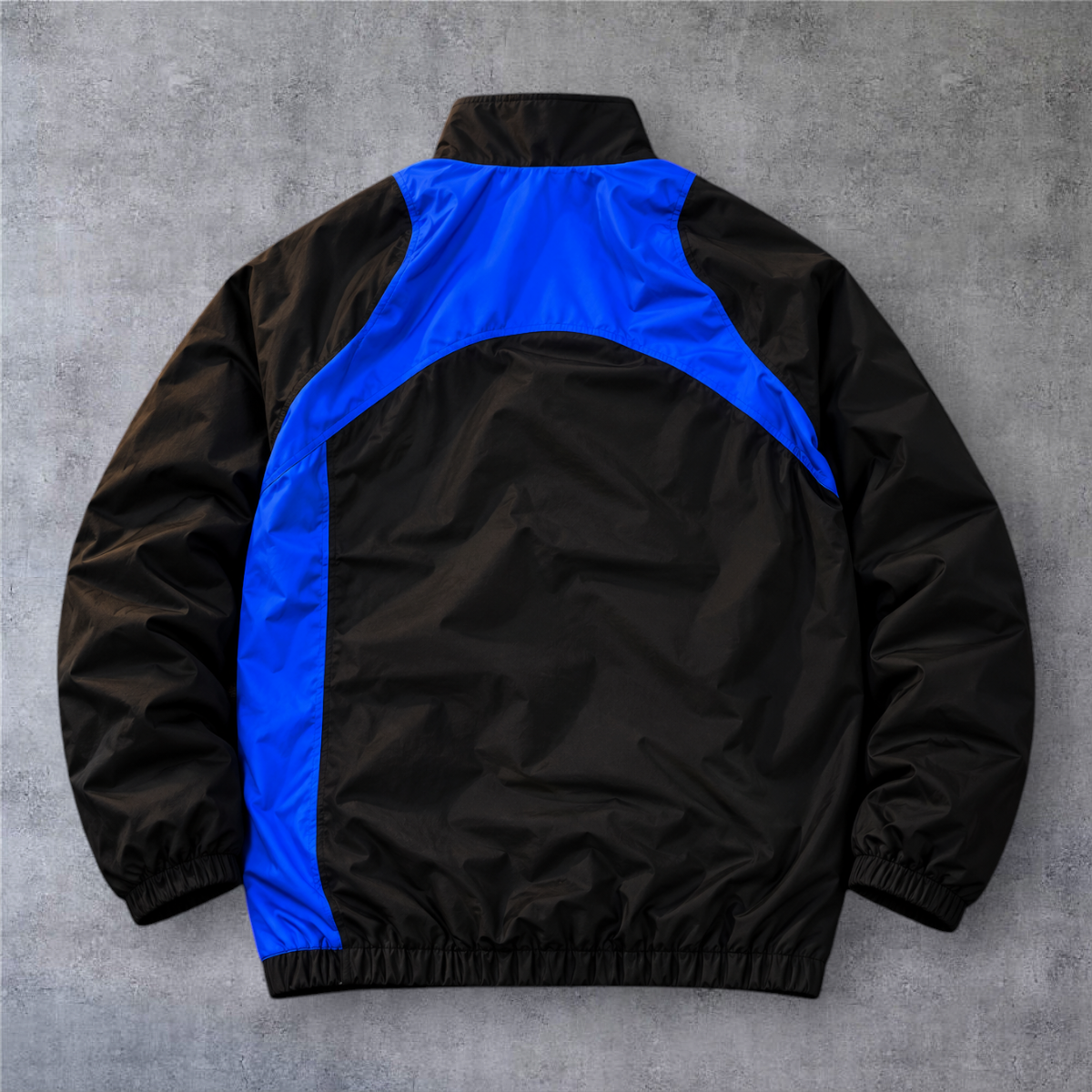 Casaco vintage de futebol Portugal da A minha loja, design full-zip preto e azul com detalhes desportivos.