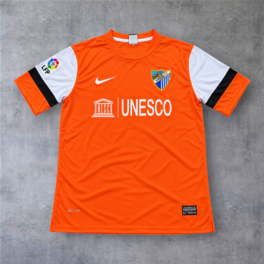 Camisola de guarda-redes A minha loja do Malaga 2012/13, cor laranja com mangas brancas e logótipo UNESCO