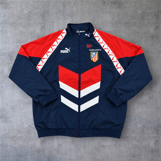 Casaco vintage A minha loja do Atlético Madrid 1994-95, azul e vermelho com fecho completo e logótipo da Puma.
