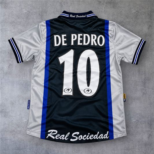 Camisola de futebol A minha loja Real Sociedad 2000/01 fora, De Pedro 10, azul e cinzenta com detalhes em branco.