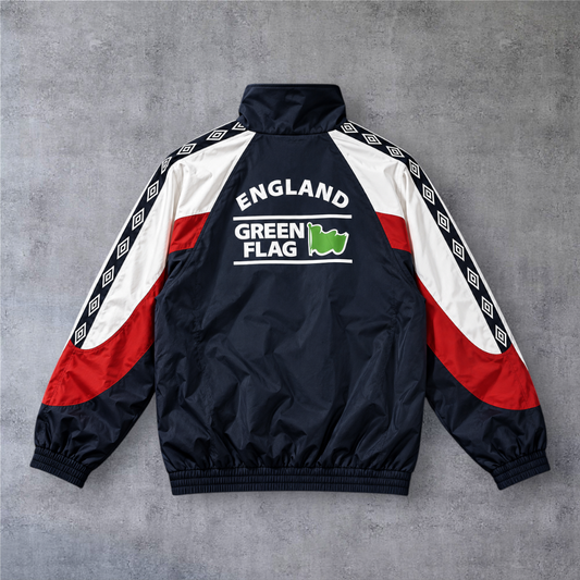 Casaco vintage England 1998 da A minha loja, azul-marinho com detalhes em branco e vermelho e logótipo nas costas.