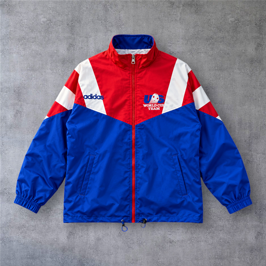 Casaco vintage A minha loja USA 1994 com fecho completo, em tons de azul, vermelho e branco com detalhes de futebol.