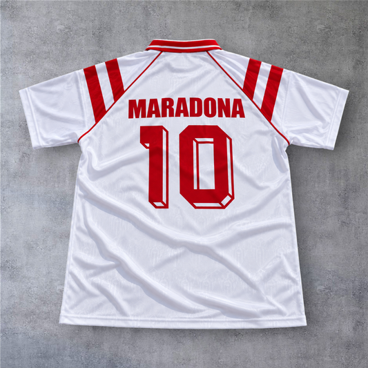 Camisola de futebol A minha loja Sevilla 1992/93 branca com o nome Maradona e o número 10 nas costas