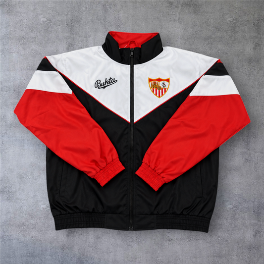 Casaco vintage A minha loja Sevilla 1992/93, design tricolor preto, branco e vermelho com fecho completo e emblema.