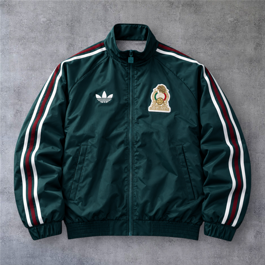 Casaco vintage da A minha loja do México dos anos 2000, verde com fecho frontal, riscas laterais e emblema da equipa.