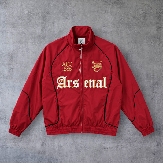 Casaco vintage vermelho do Arsenal da A minha loja com fecho frontal, emblema do clube e detalhes em dourado.