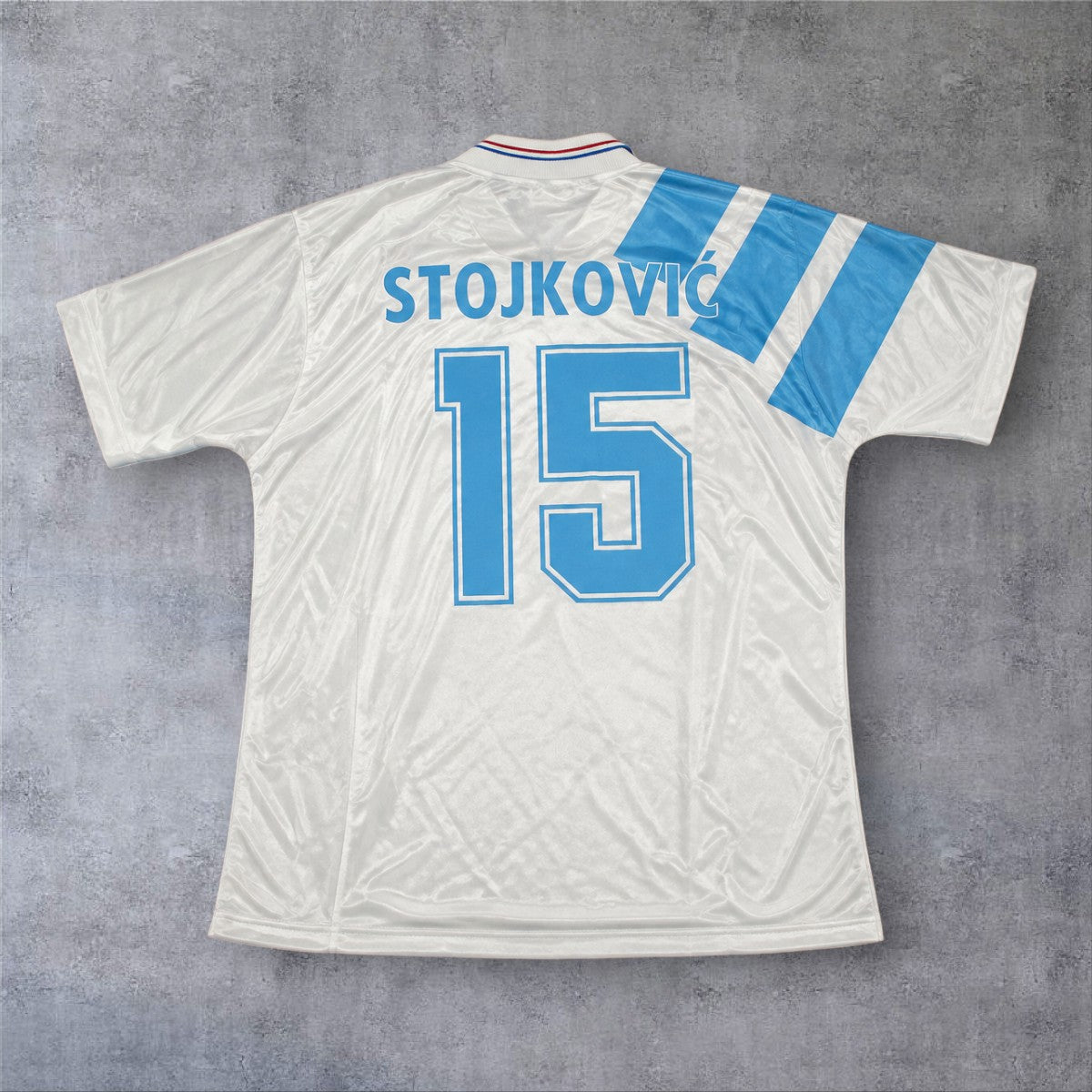 Camisola de futebol A minha loja Marseille 1992/93 branca com o nome Stojkovic e o número 15 nas costas